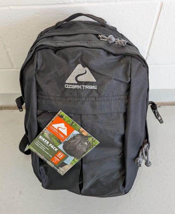 The black Ozark Trail Hiker Pack became one of the most closely watched clues after the FBI said a similar backpack appeared in doorbell footage from Nancy's home. Investigators later reviewed purchase records and surveillance connected to the item as they tried to identify the masked subject. | Source: X/@fbiphoenix