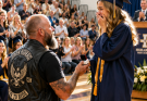 A Biker Appeared Uninvited at His Daughter’s Graduation After Ten Years Apart and Said, “I’ll Leave Right Away” — Everyone Feared the Worst, But the Only Thing He Carried Was a Promise He Had Never Broken, Unaware She Was About to Chase After Him Through Her Tears