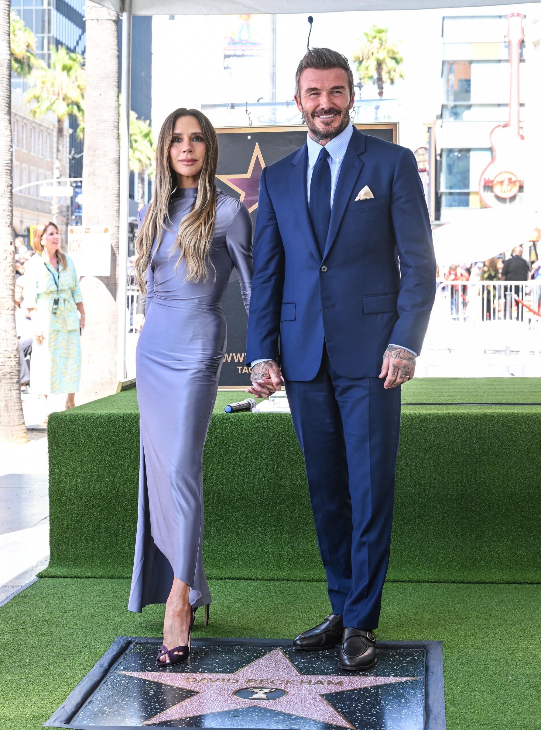 Meanwhile, onlookers also took notice of Victoria Beckham's choice of footwear, as she and David Beckham were photographed at the ceremony to honor him with a star on the Hollywood Walk of Fame on June 12, 2026, in Los Angeles, California. | Source: Getty Images