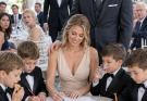 My brother sent me to the kids’ table at his wedding and whispered, “Don’t ruin the image,” but everything changed when the billionaire boss he wanted to impress sat next to me and shattered his humiliation.