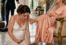 I came back for some confidential documents and found my 8-month pregnant wife kneeling, crying while washing my mother’s feet. “This house belongs to my children, not to you,” she said. I held my breath, gathered two suitcases, and showed her bank statements revealing who had been stealing from us for months.